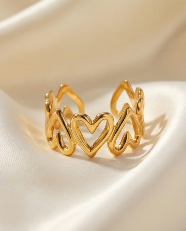 Δαχτυλίδι ατσάλινο με χρυσές καρδιές