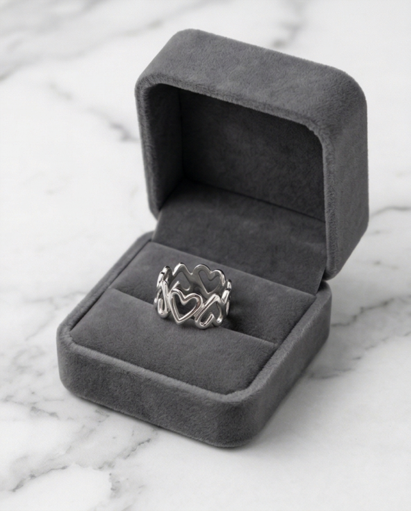 Δαχτυλίδι ατσάλινο με ασημί καρδιές