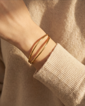 Βραχιόλι επιχρυσωμένο ατσάλι ανοιχτό με κύμα