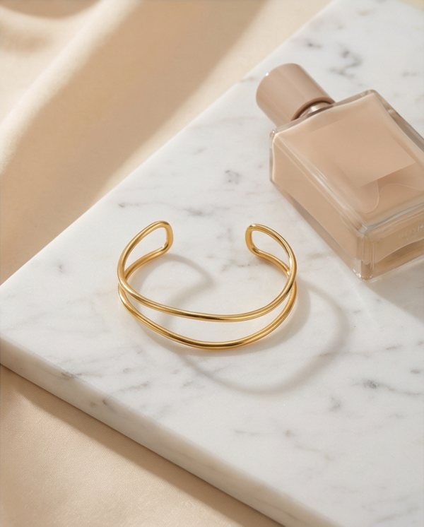 Βραχιόλι επιχρυσωμένο ατσάλι ανοιχτό με κύμα